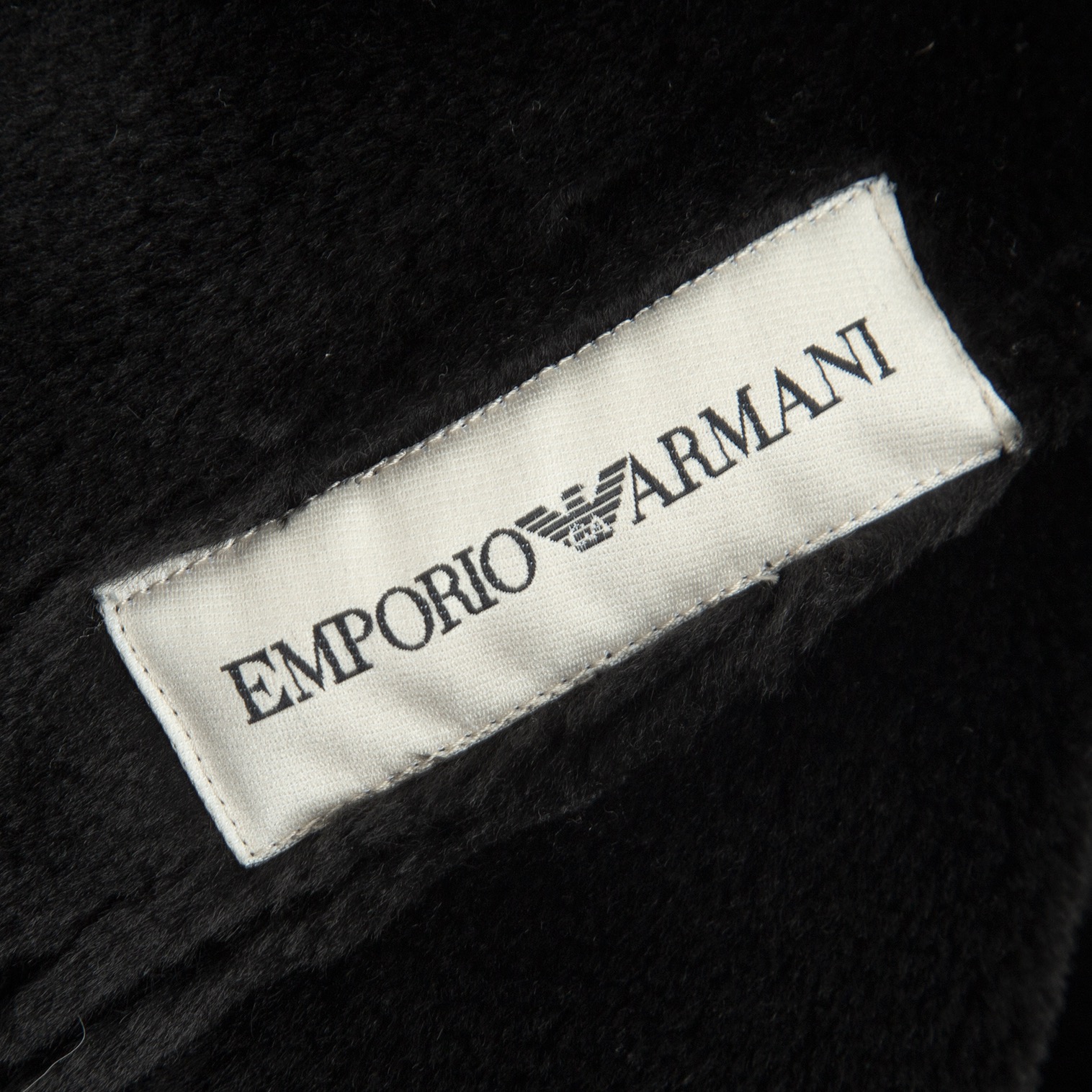エンポリオアルマーニEMPORIO ARMANI フェイクムートンロングコート 黒50